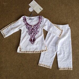 Embroidered outfit for a little baby girl